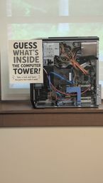 A member of our community kindly donated a computer he no longer uses. Thanks to his generosity, the Computer Room now has a real PC that we can open, explore, and learn from together! This gives everyone a hands‑on look at what’s inside a computer, without having to rely on pictures from the internet or guess what each part looks like. It’s a fun and interactive way to understand the components and peripherals that make a computer work. Do you know the names of each part?