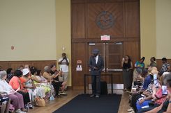 The Rock the Runway Fashion Show at the Raymond Jordan Senior Center showcased a lively community gathering featuring a full runway, an engaged audience, and a diverse lineup of participants presenting a wide range of unique outfits, from formal attire and coordinated sets to cultural garments and creative designs. Attendees filled the room, capturing moments on their devices and applauding each model who walked the runway, including individuals dressed in detailed patterns, bright colors, textured fabrics, accessories, and themed ensembles. The event included stage moments, presentations, and celebratory gestures, adding to its energetic atmosphere. Supported by the Springfield Department of Elder Affairs, the fashion show emphasized creativity, self‑expression, local engagement, and community pride, with in‑person registration and event details promoted through the official Rock the Runway flyer for July 11, 2025.