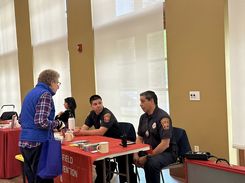 This image from the Spring Into Wellness event held on May 15 provides a wide view of the event floor, showing community members engaging with various health, wellness, and support organizations.